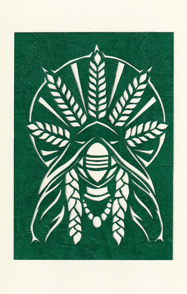 A green paper-cut artwork